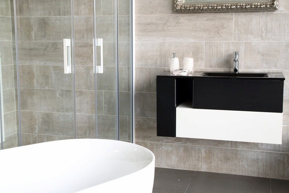 A Bathroom With a Bathtub, Sink, and Shower Stall — Bulli Glass in Kiama, NSW