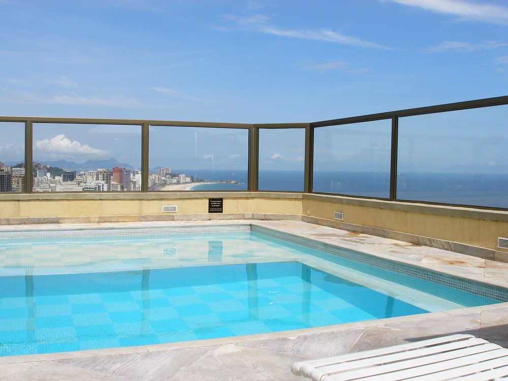 A Large Swimming Pool With a View of the Ocean — Bulli Glass in Bulli, NSW