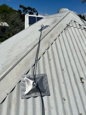 a roof with a roof access system on top of it