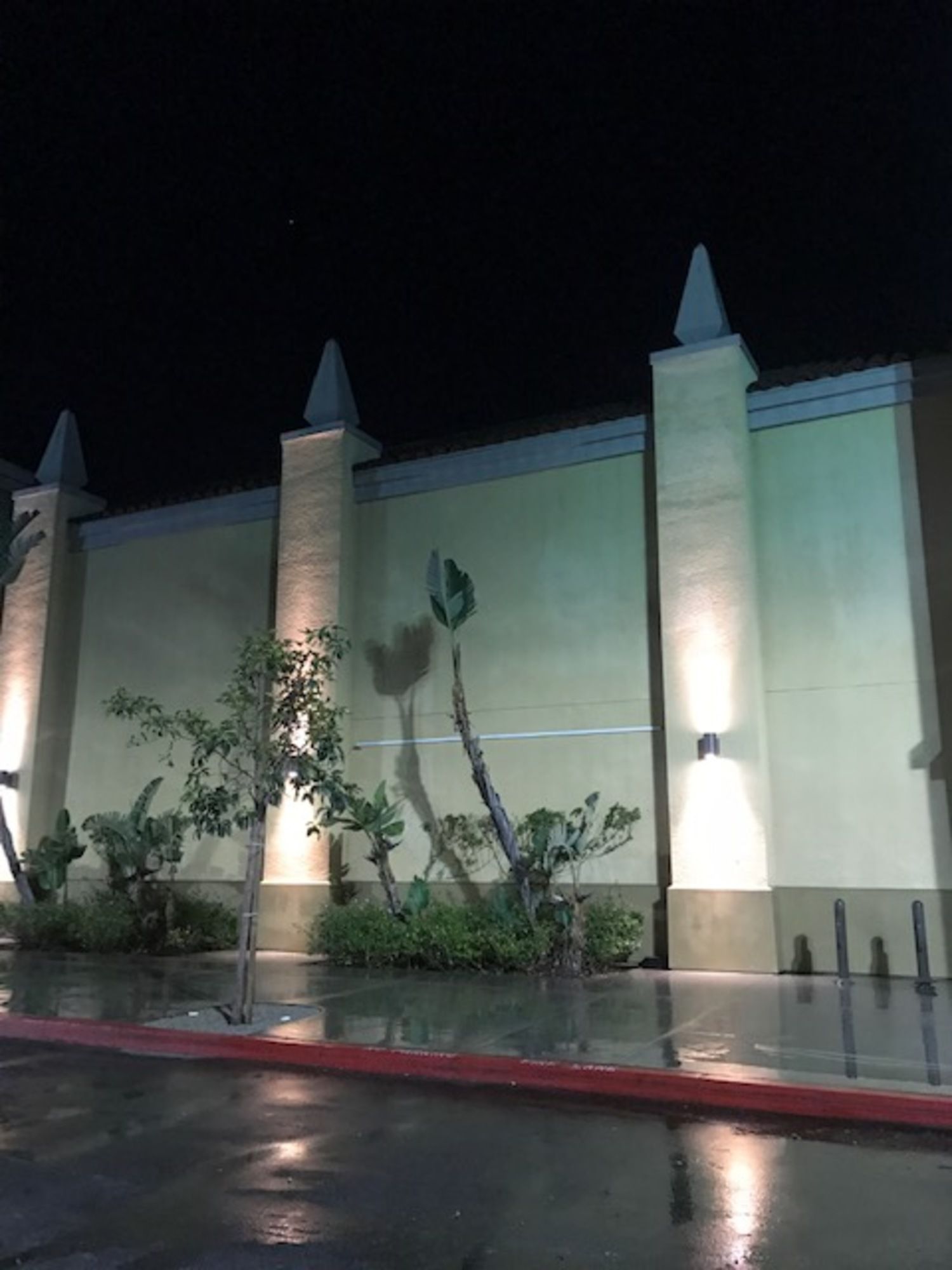 A large building with a lot of lights on it at night