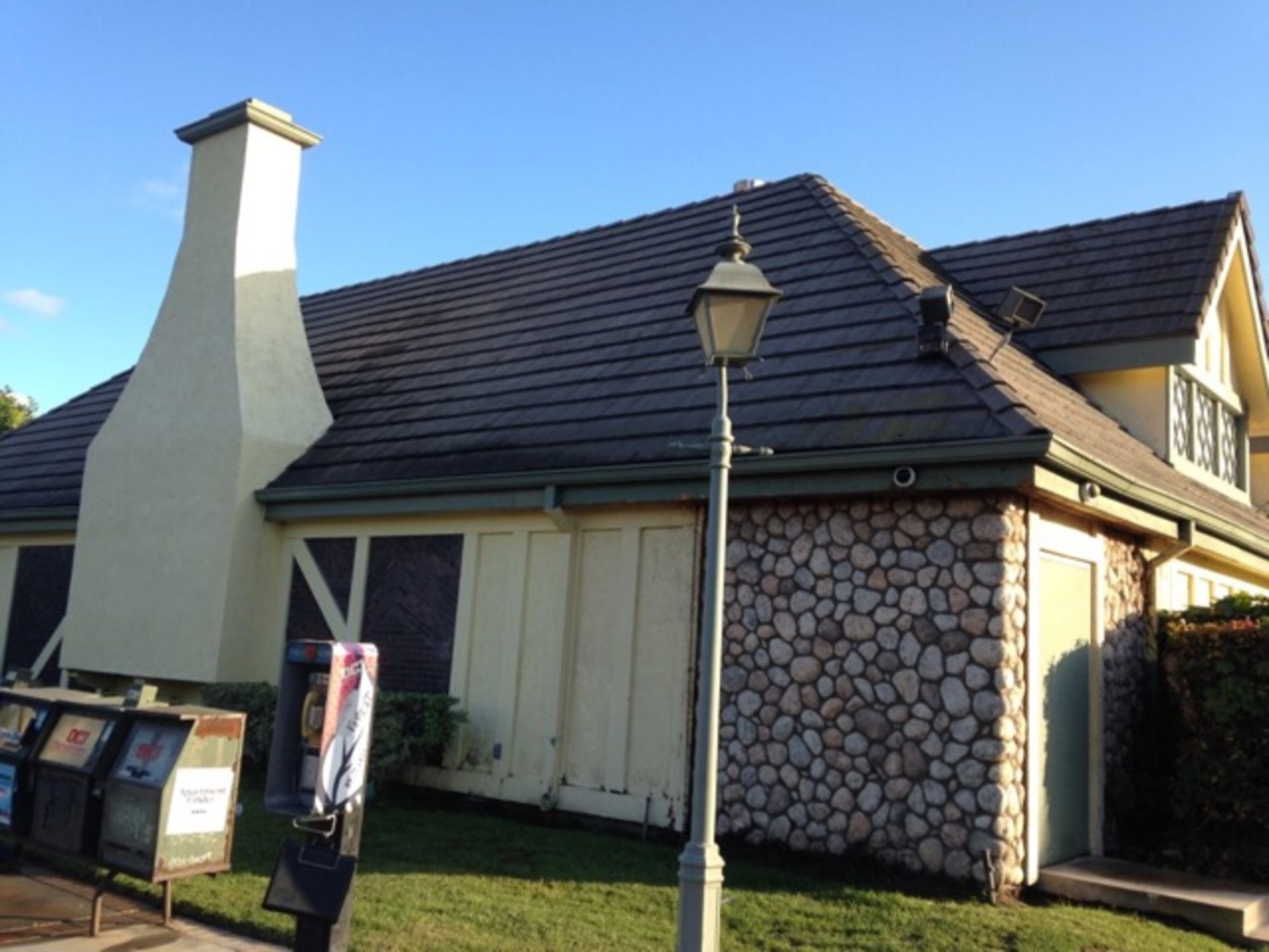 A house with a chimney on the side of it
