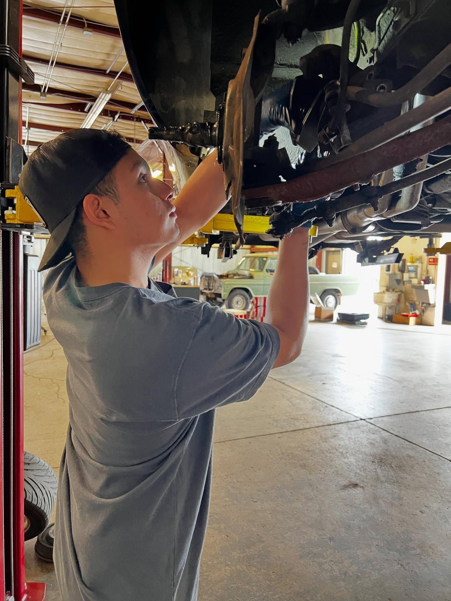 Mechanic Working on a Vehicle | Gearheadz Garage