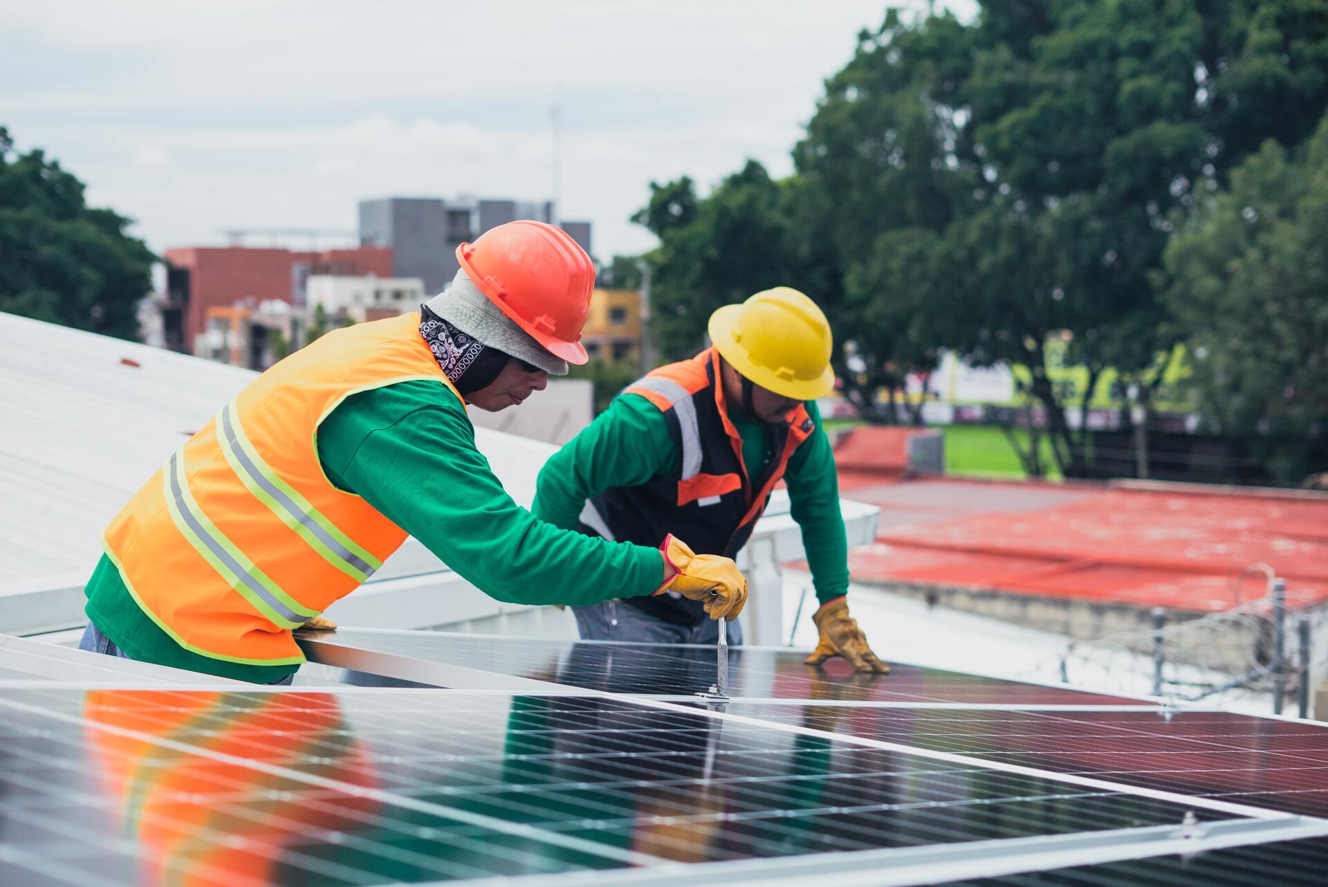 Men Installing Solar Panels for ESG Reporting