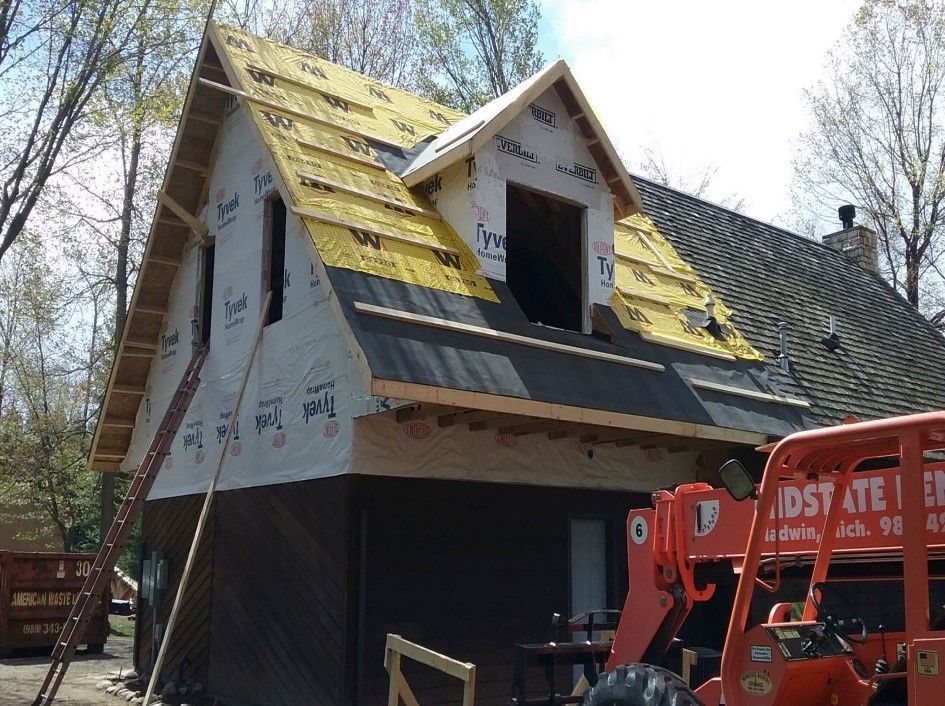 Tab styled asphalt roof shingles — Northville, MI — Choice Home Improvement