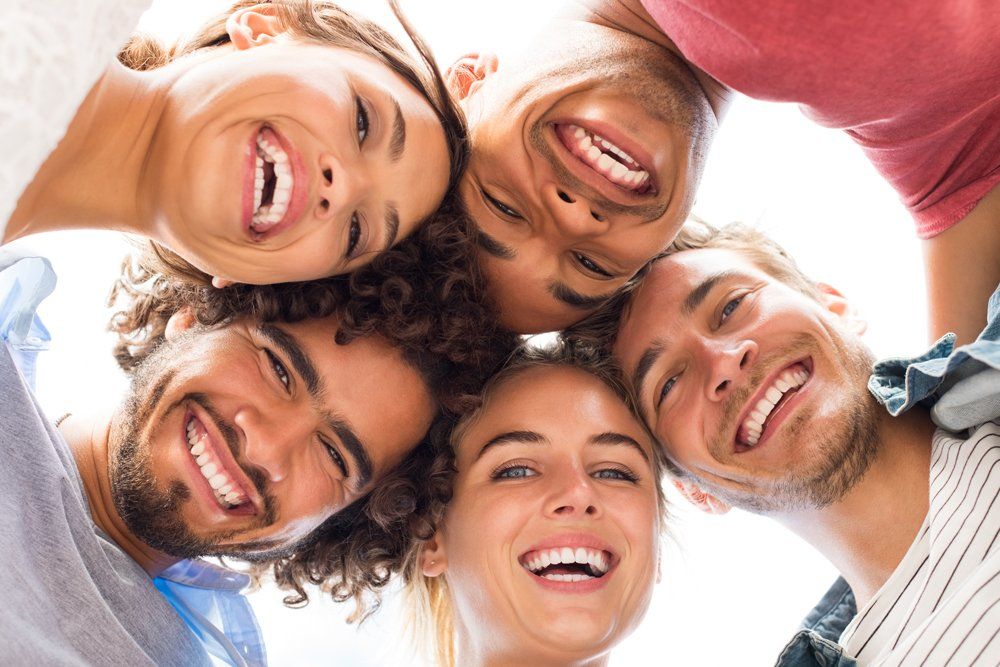 Teeth Bonding — Five People Smiling in Tupelo, MS