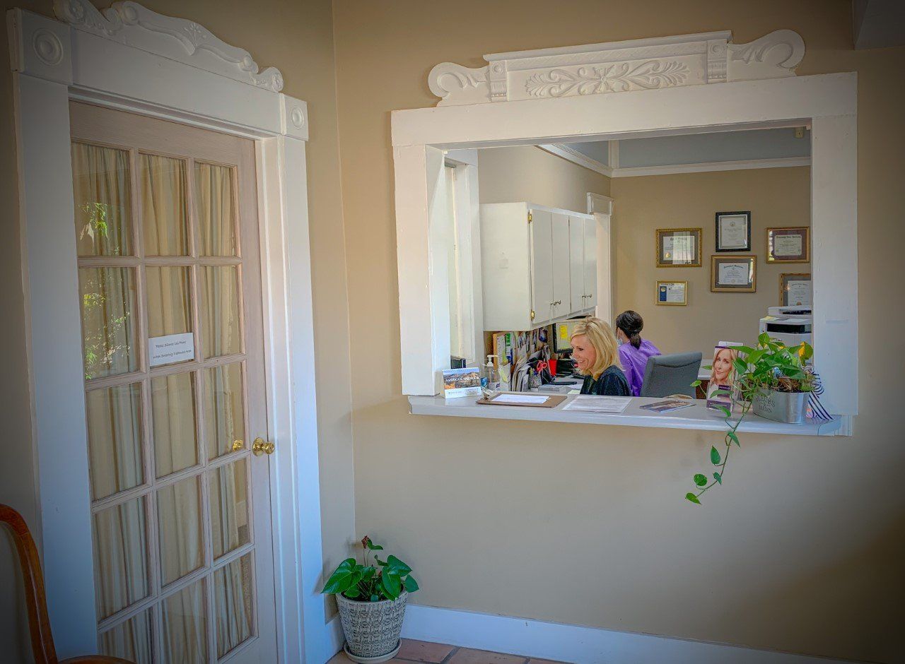 Teeth Filling — Dentist Showing Patient's X-ray in Tupelo, MS