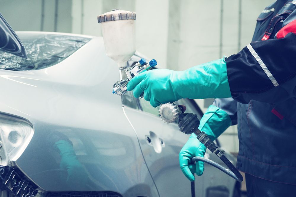 Car Painting Using Spray Gun — Vehicle Repairs in Tuncurry, NSW
