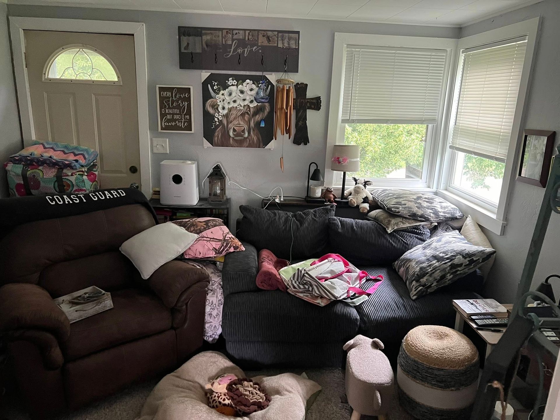 A living room filled with furniture and a couch.