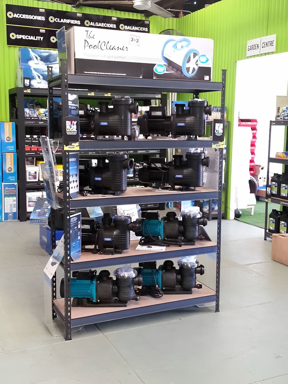 A Shelf Full Of Pool Pumps In A Store — Manning Valley Pumps And Irrigation In Gloucester, NSW