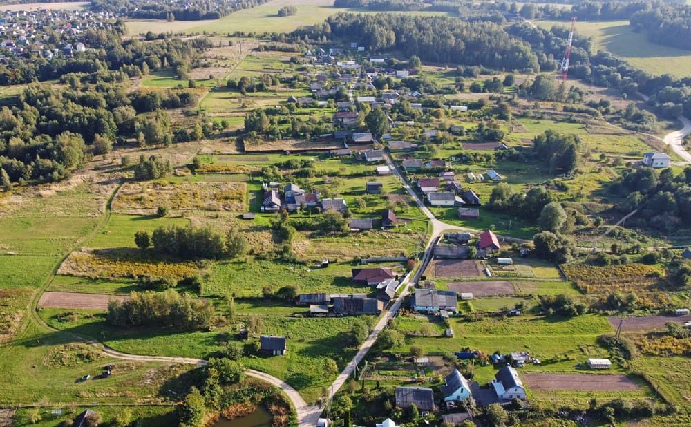 An Aerial View Of A Small Village Surrounded By Fields — Manning Valley Pumps And Irrigation In Nabiac, NSW
