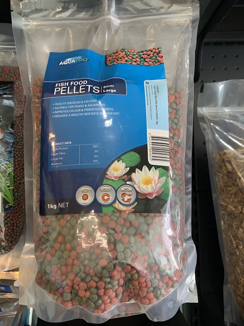 A Bag Of Fish Food Is Sitting On A Table — Manning Valley Pumps And Irrigation In Wingham, NSW