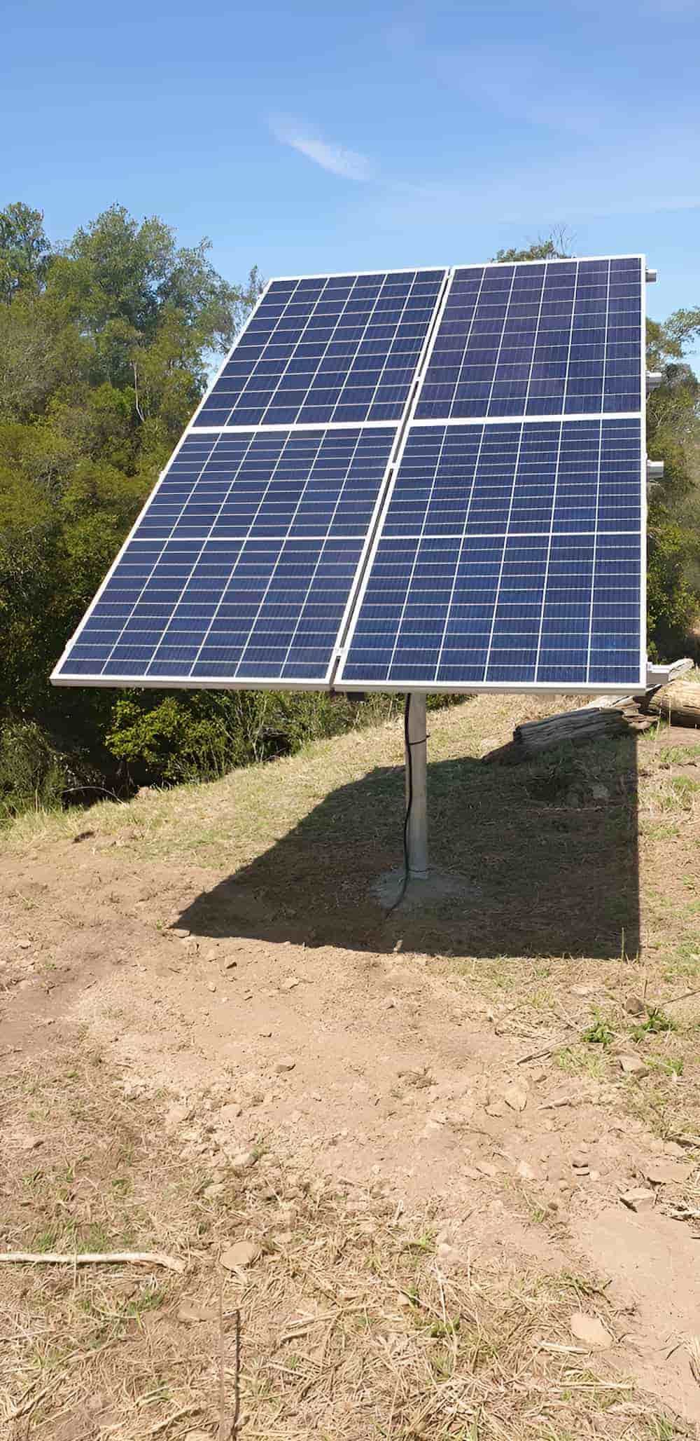 A Solar Panel Is Sitting On Top Of A Dirt Field — Manning Valley Pumps And Irrigation In Gloucester, NSW
