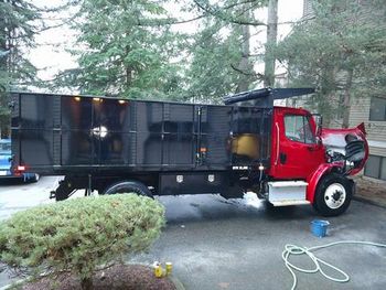 Dumpster Hauler Truck — Kirkland, WA — Eastside Construction