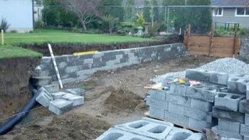 Backyard Retaining Wall Brick — Kirkland, WA — Eastside Construction