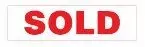 A red sold sign on a white background.
