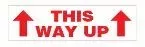 A sign that says `` this way up '' with two red arrows pointing up.