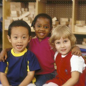 Children Sitting On Floor Of Classroom — Children Center in Rochester, MM