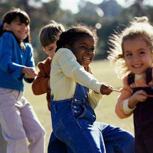 Group of children playing tug-of-war — Children Center in Rochester, MN