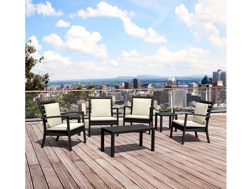A Patio Set With Chairs and a Table on a Wooden Deck Overlooking a City — Creative Commercial Furniture in Cairns City, QLD 