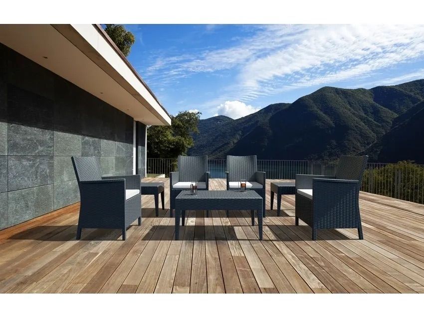 A Wooden Deck With a Patio Set and Mountains in the Background β Creative Commercial Furniture in Cairns City, QLD