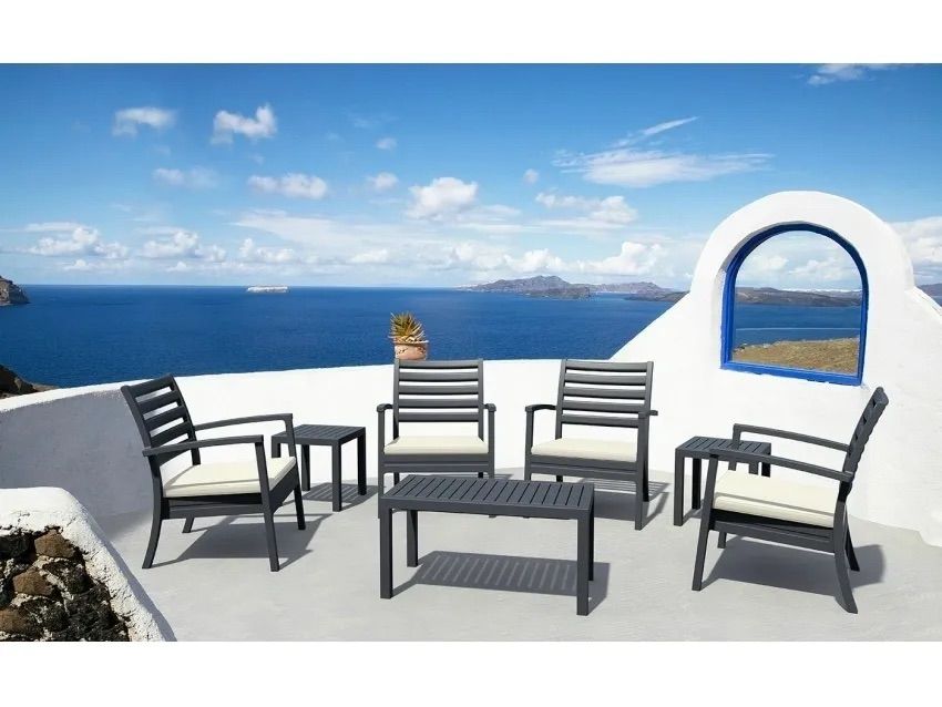 A Patio With Chairs and a Table Overlooking the Ocean β Creative Commercial Furniture in Cairns City, QLD