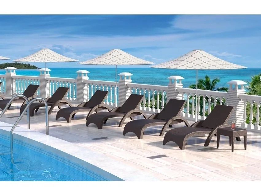 A Row of Lounge Chairs and Umbrellas Next to a Swimming Pool β Creative Commercial Furniture in Cairns City, QLD