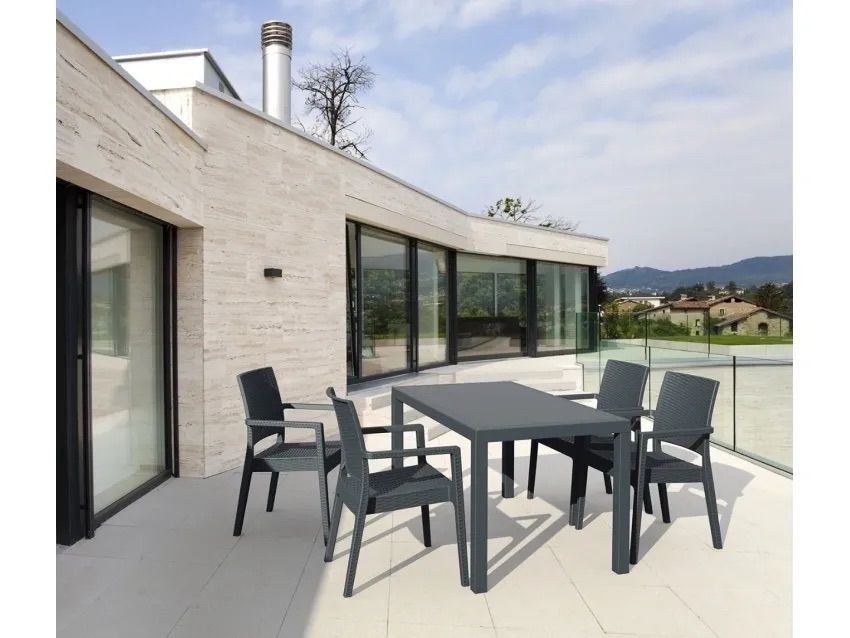 A Patio With a Table and Chairs in Front of a Building β Creative Commercial Furniture in Cairns City, QLD
