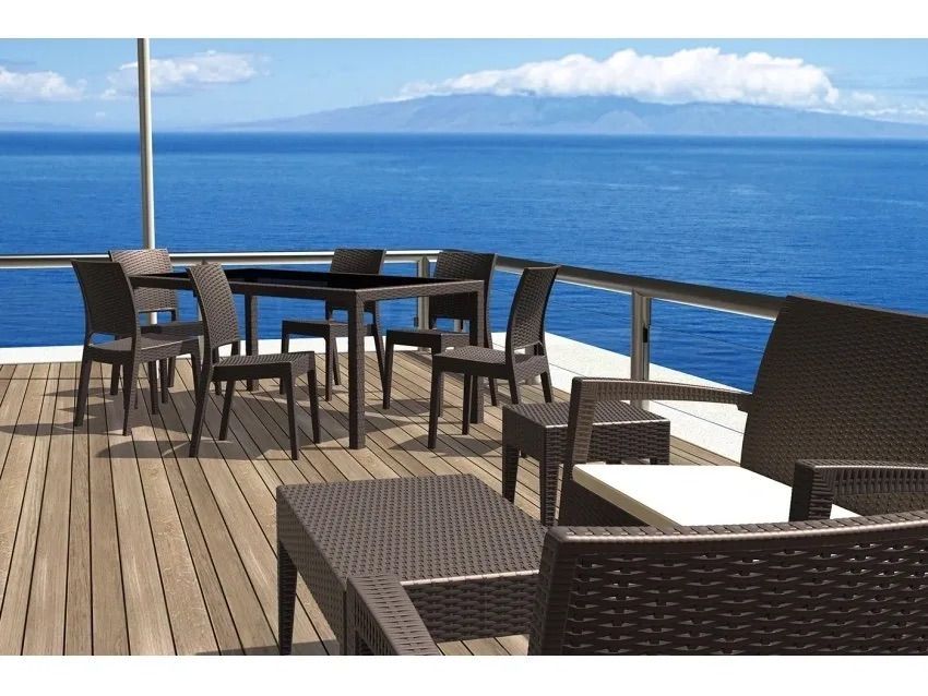 A Deck With a Table and Chairs Overlooking the Ocean β Creative Commercial Furniture in Cairns City, QLD