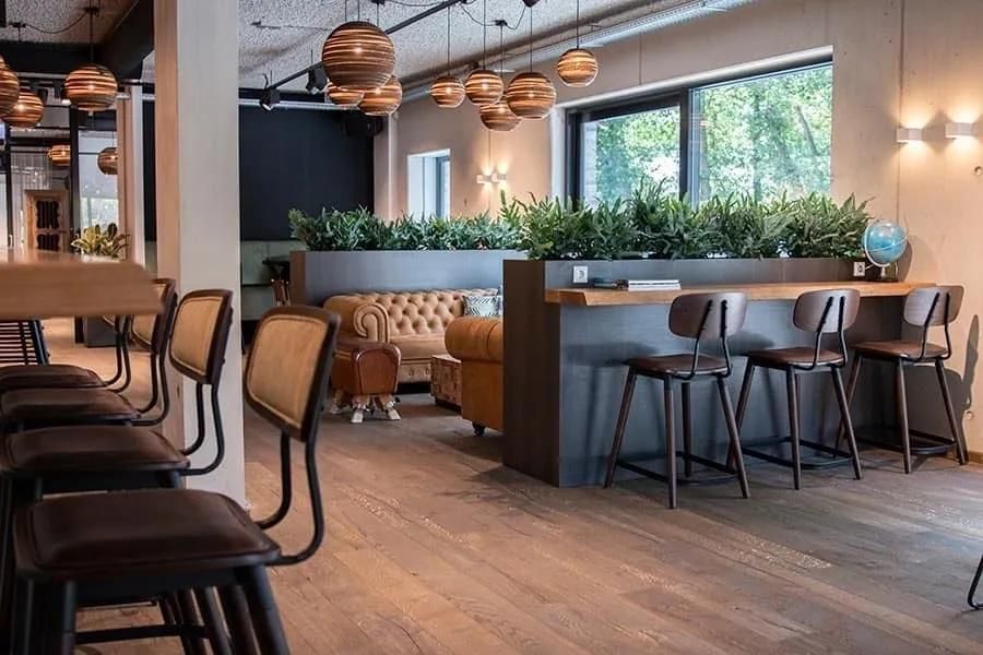 Elegant Restaurant With Tables, Chairs and Pendant Lights — Creative Commercial Furniture in Cairns City, QLD 