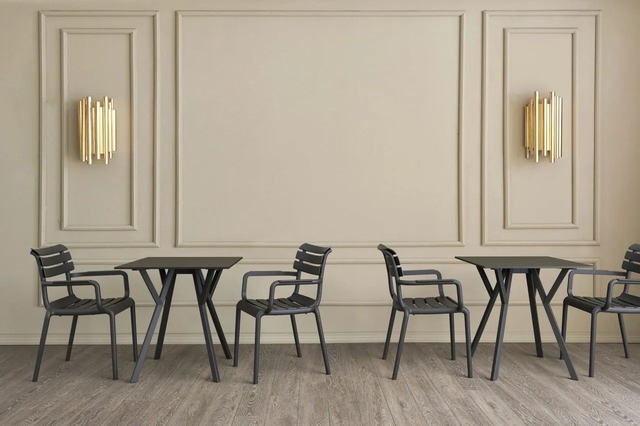 A Row of Tables and Chairs in a Room With a Wall β Creative Commercial Furniture in Cairns City, QLD