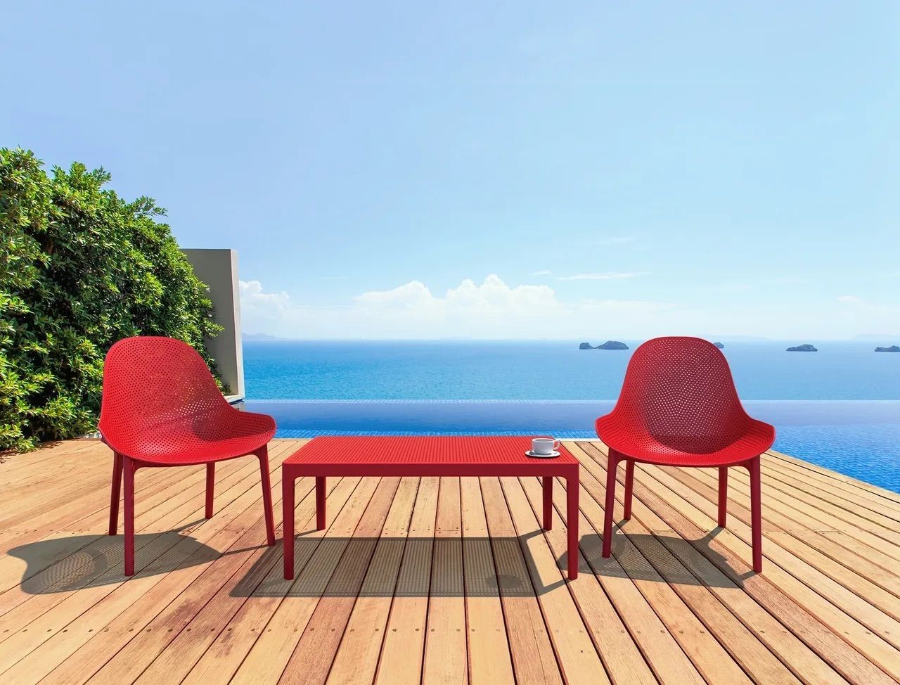 Two Red Chairs and a Red Table on a Wooden Deck Overlooking the Ocean β Creative Commercial Furniture in Cairns City, QLD