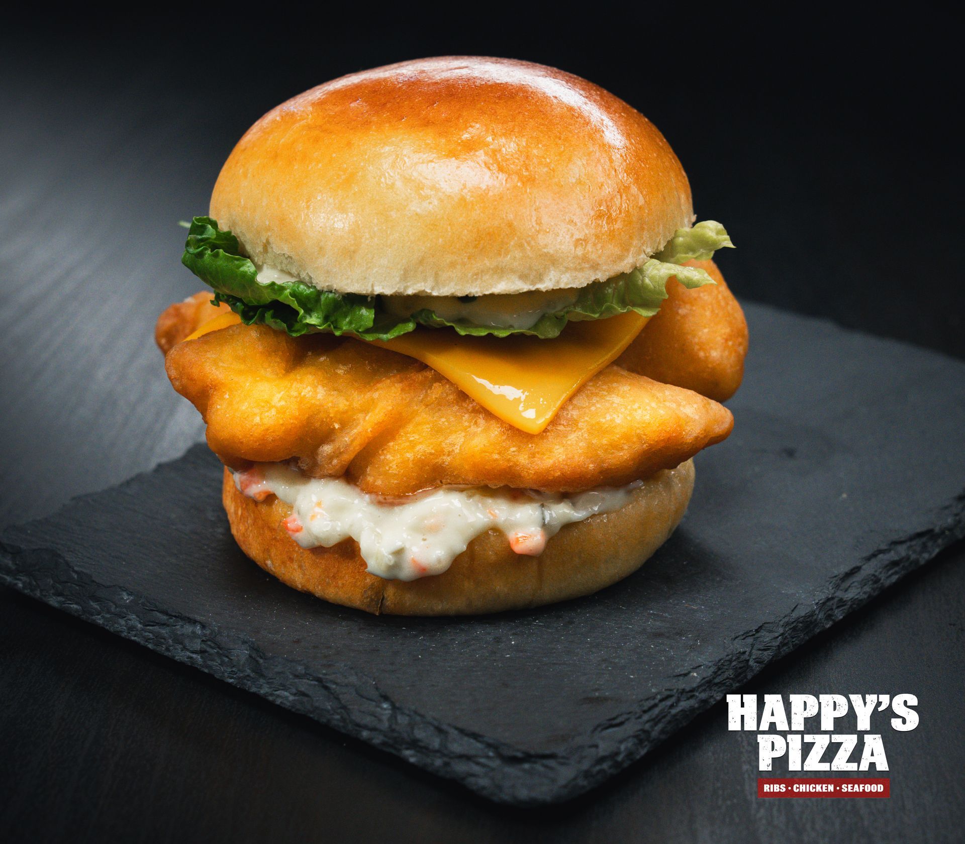 A fried fish sandwich from happy 's pizza