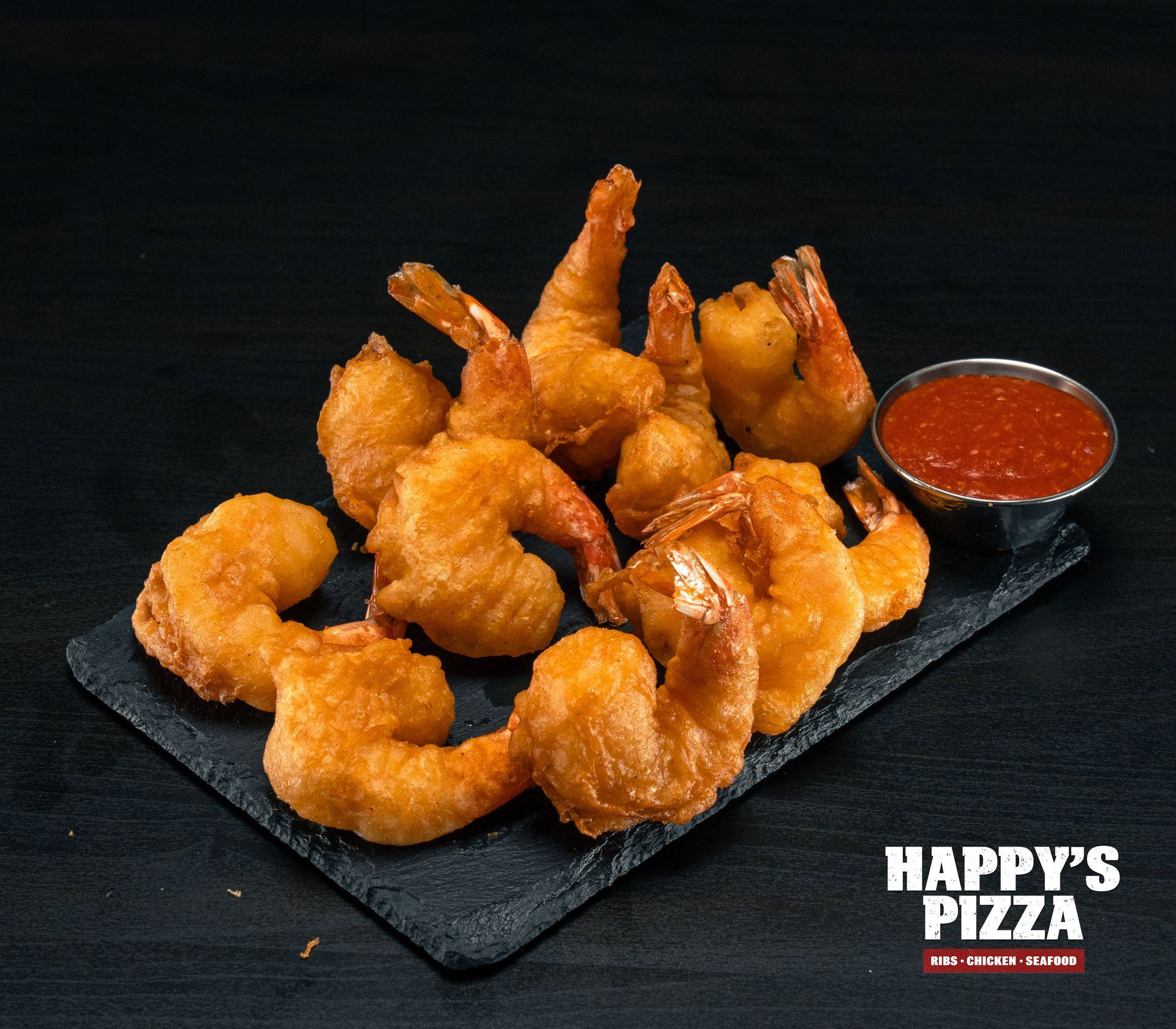 A plate of fried shrimp from happy 's pizza