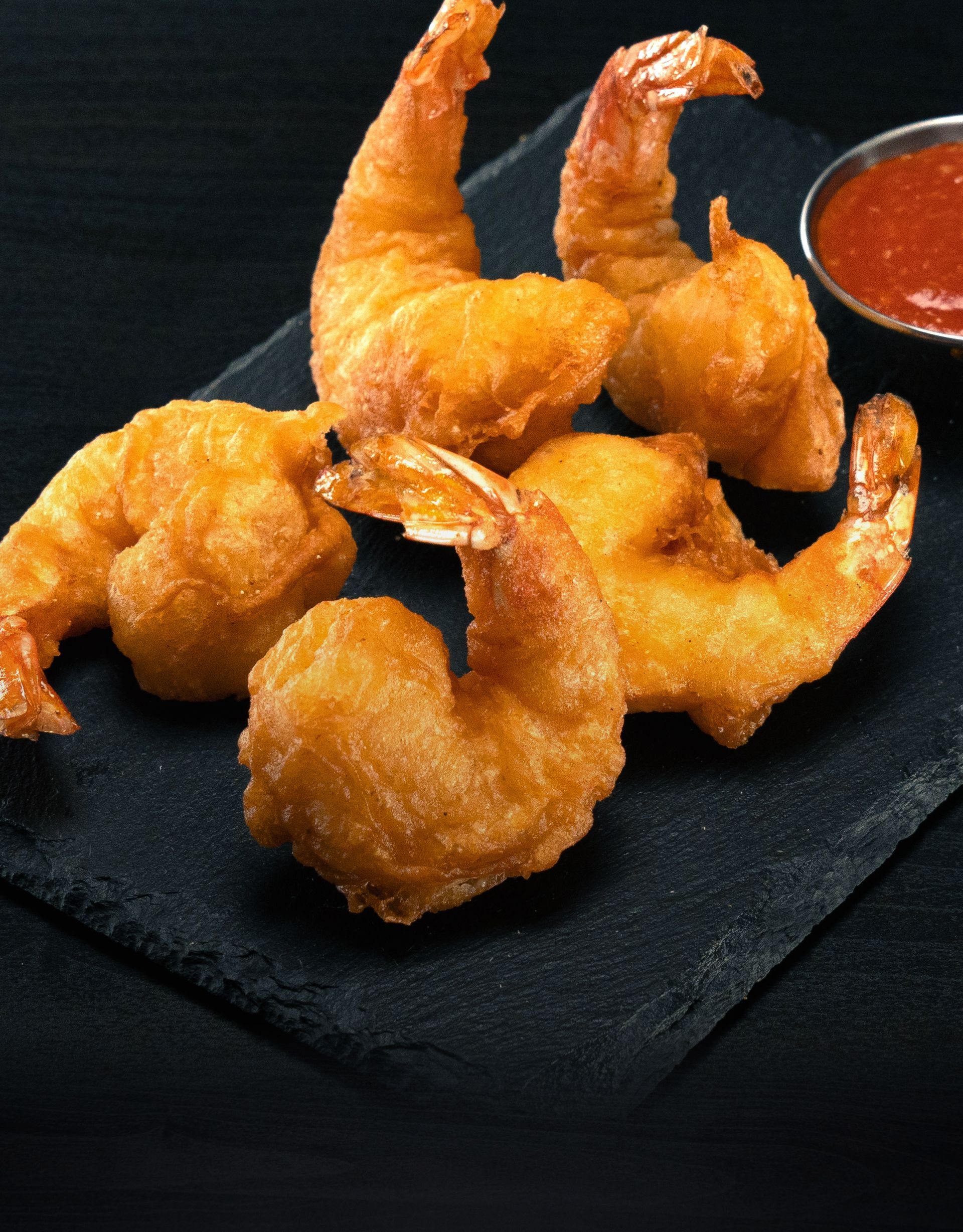 Half pound of crispy fried jumbo shrimp, served with tangy cocktail sauce for dipping.