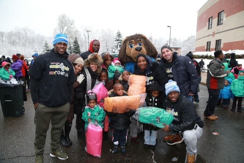 Happy’s Pizza staff and volunteers giving back to the community during the annual Coats 4 Kids event.