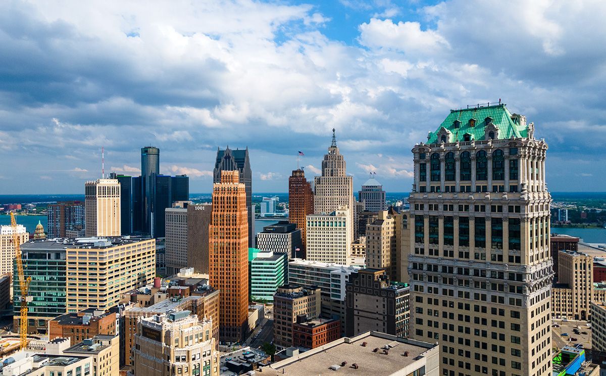 Drone shot of downtown Detroit's skyline with high-rise buildings