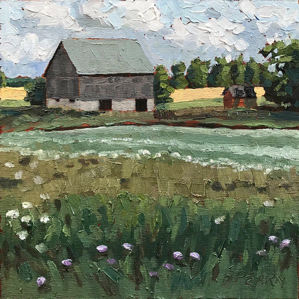 Farm with queen anne's lace growing in front.