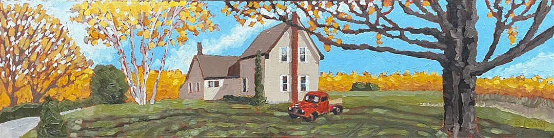 Old Red Truck in front of small house.