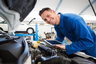 Auto Body Estimate — Smiling mechanic In Cocoa, FL