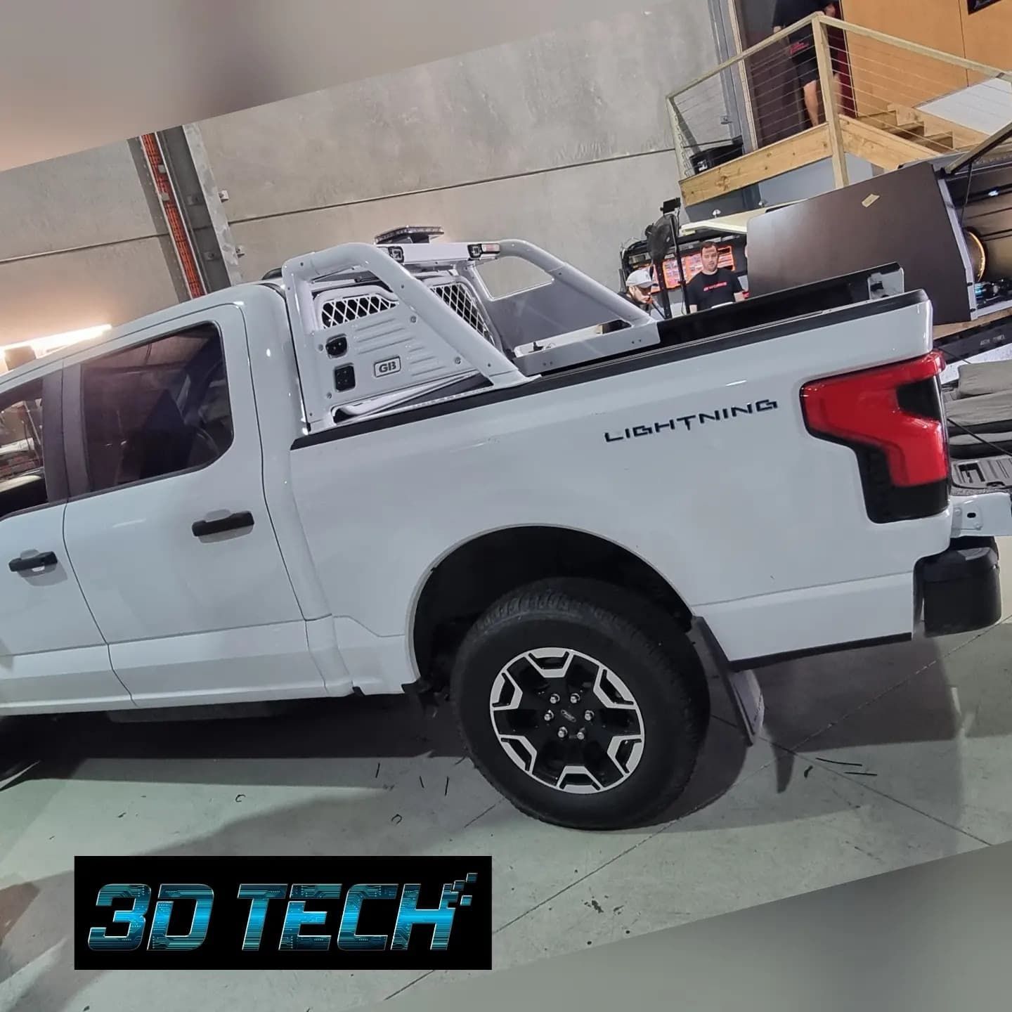 A White Lightning Truck is Parked in a Garage — 3D Tech In Sancrox, NSW