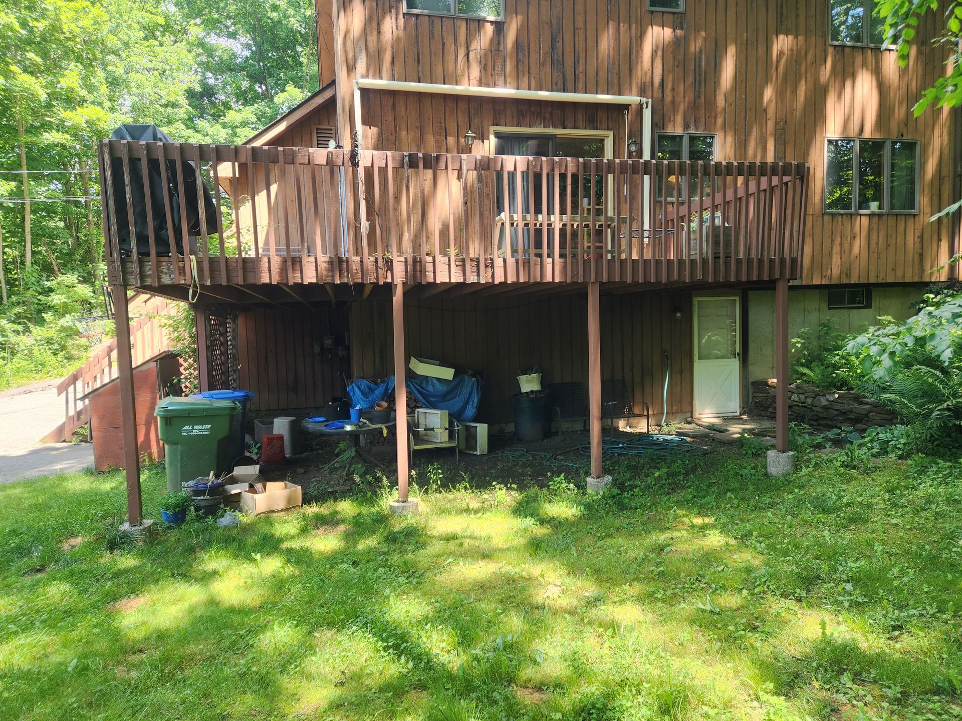 A finished deck construction and installation​ in Glastonbury CT by Exteriors of CT
