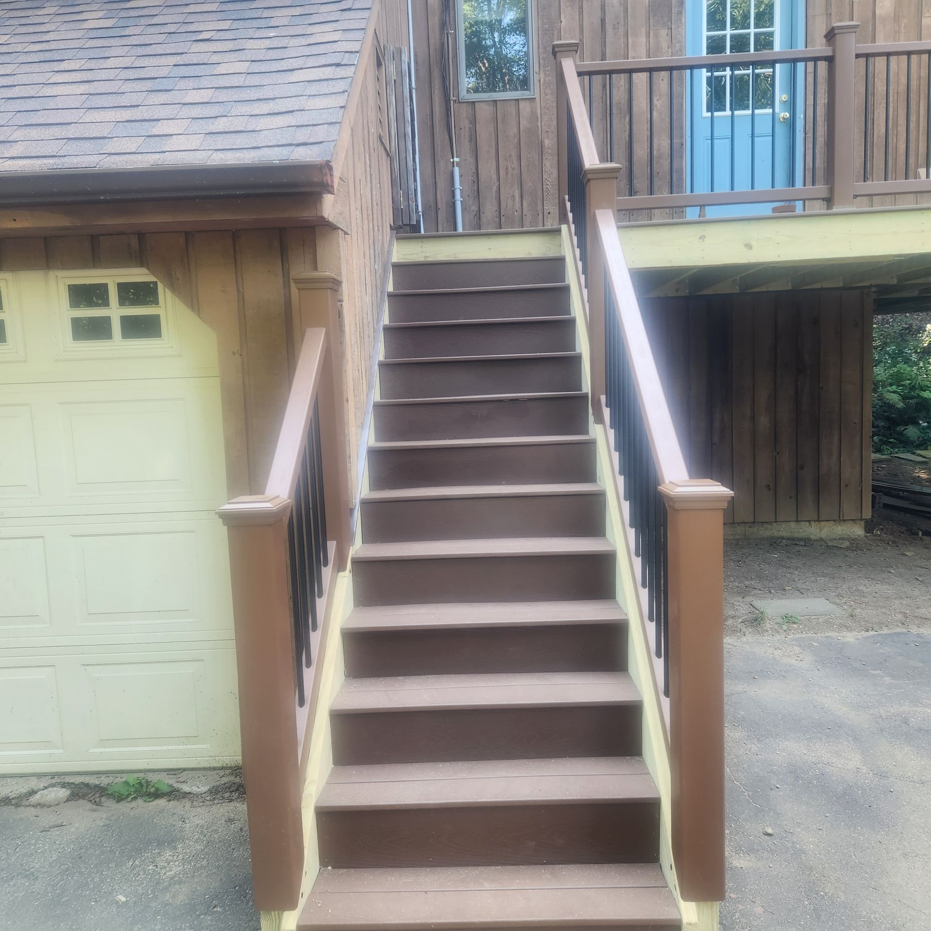 A finished deck construction and installation​ in Glastonbury CT by Exteriors of CT