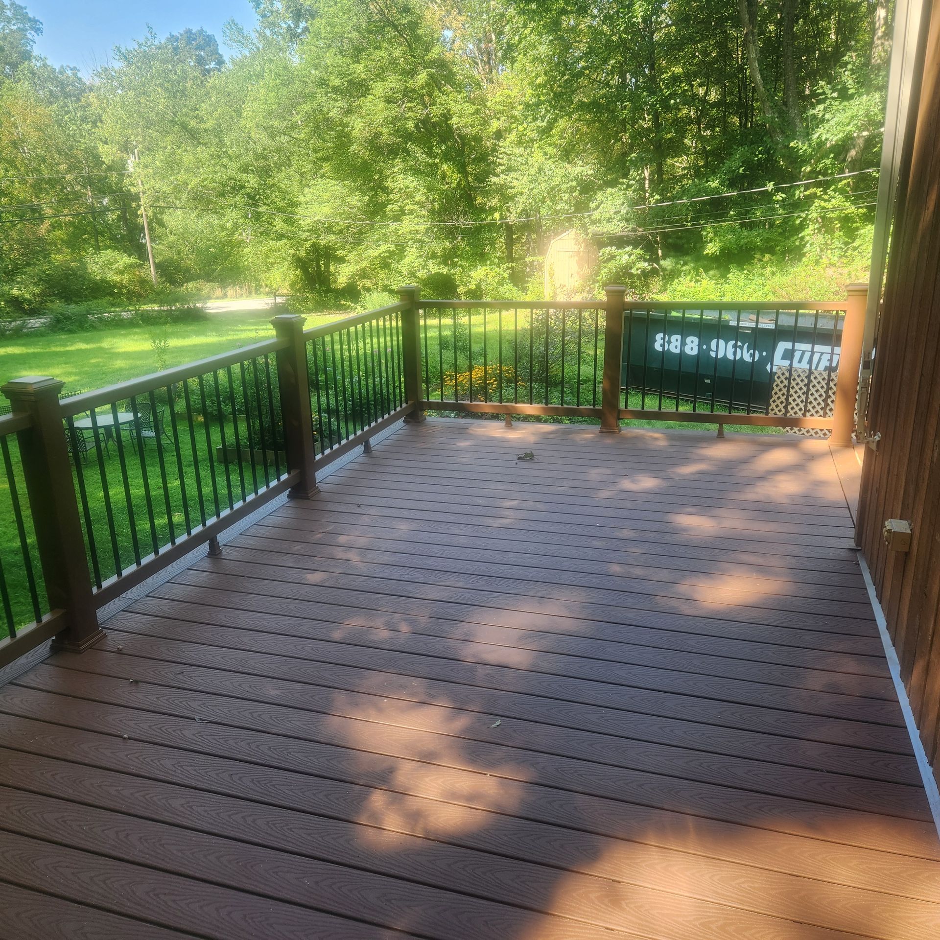 A finished deck construction and installation​ in Glastonbury CT by Exteriors of CT