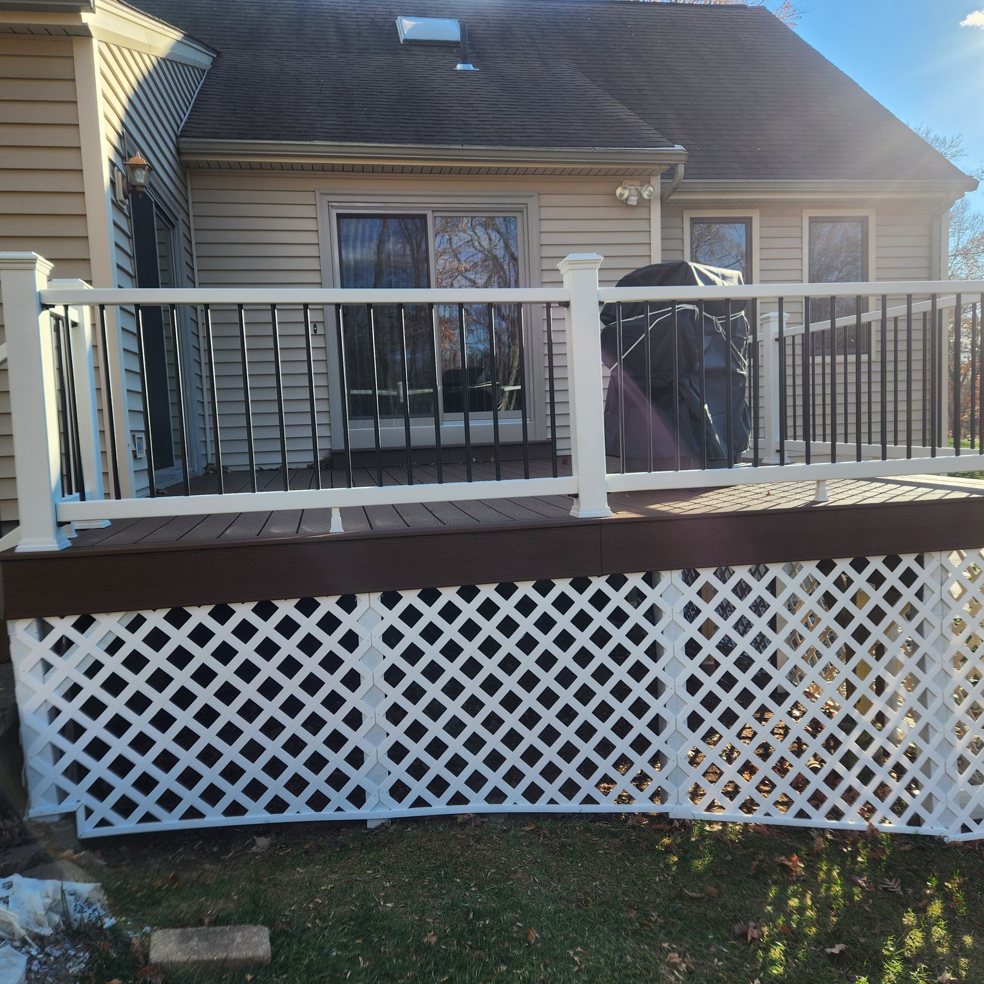 A finished deck construction and installation​ in Glastonbury CT by Exteriors of CT