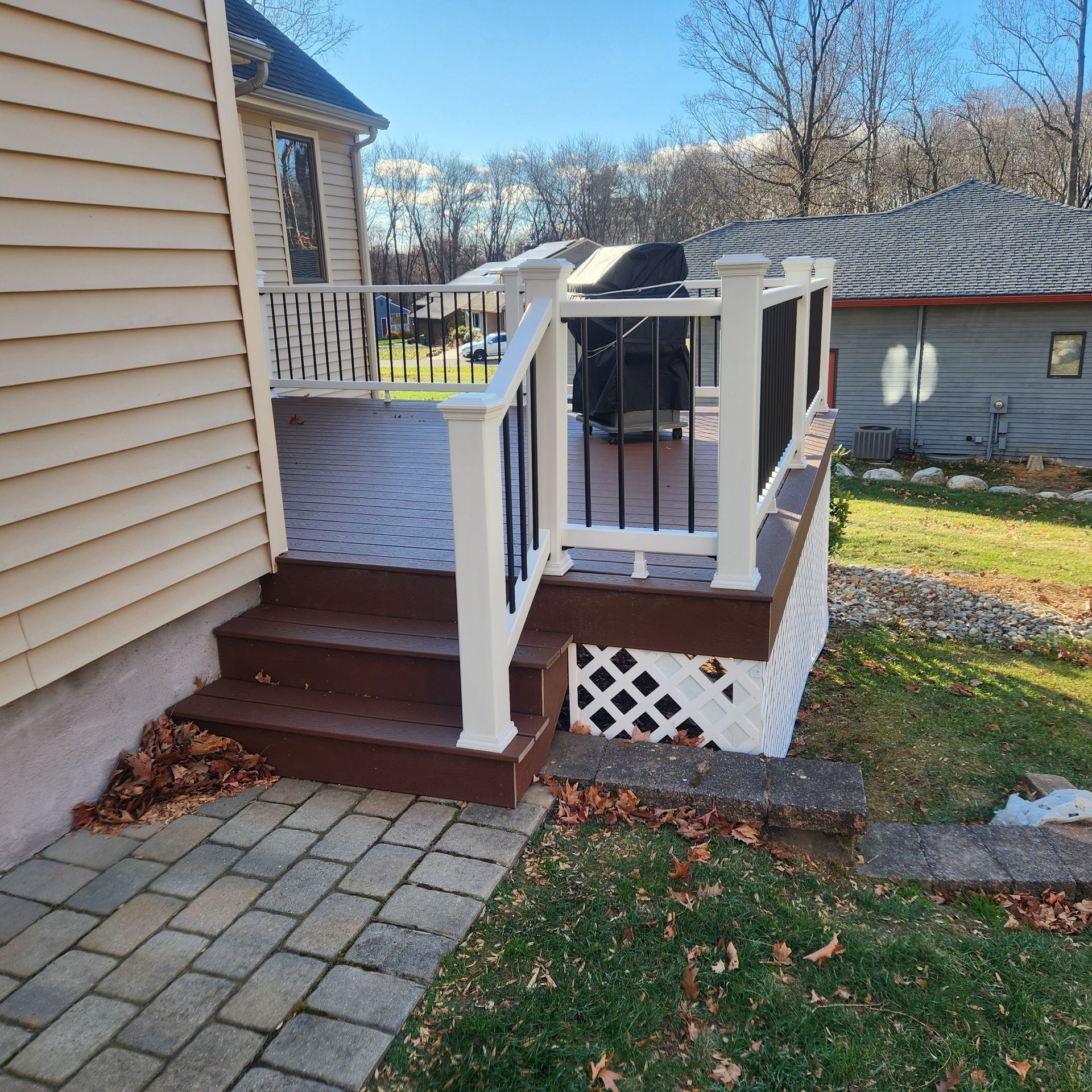 A finished deck construction and installation​ in Glastonbury CT by Exteriors of CT