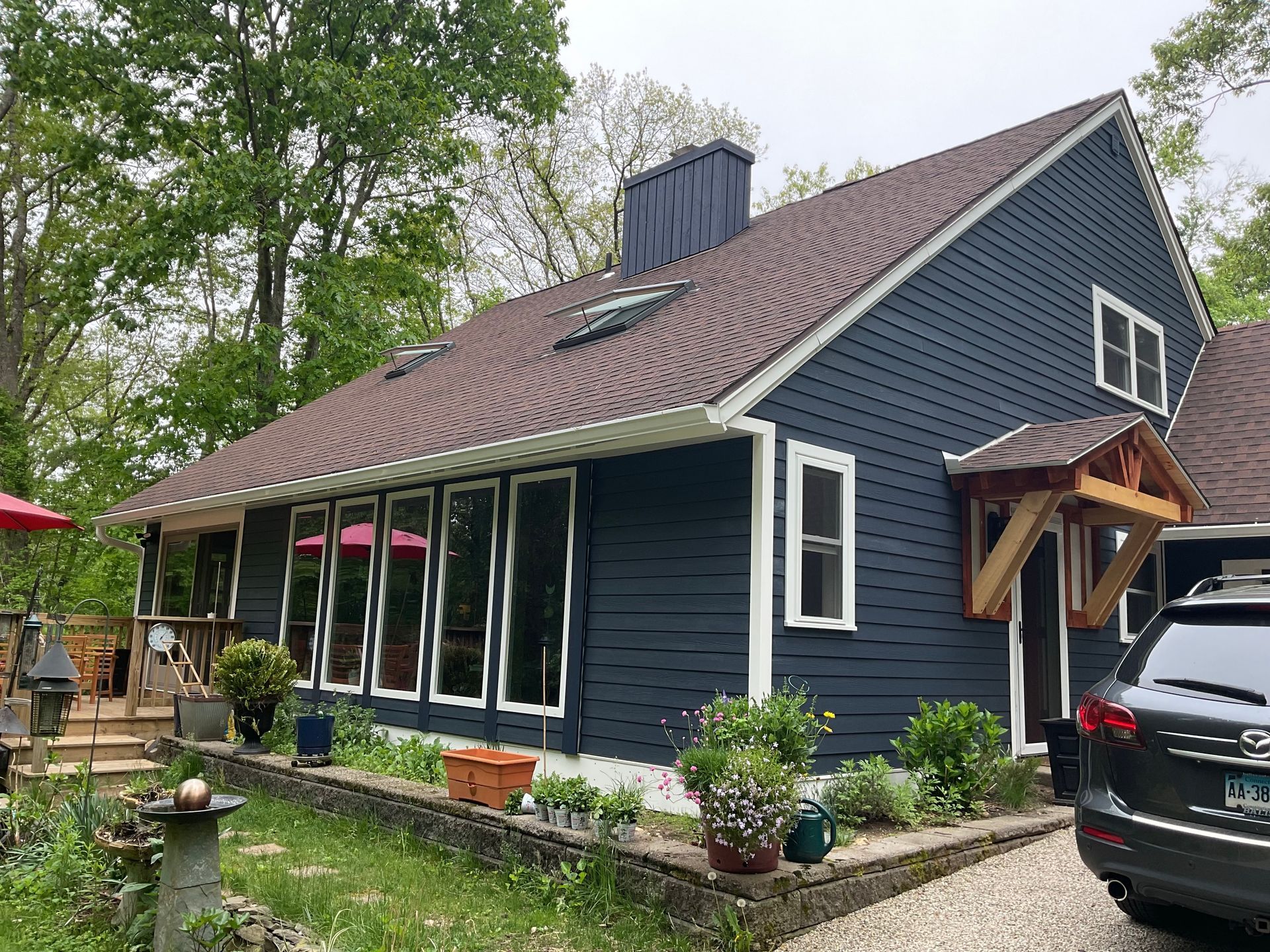 A new siding installation in Glastonbury, CT in action - Exteriors of CT hard at work