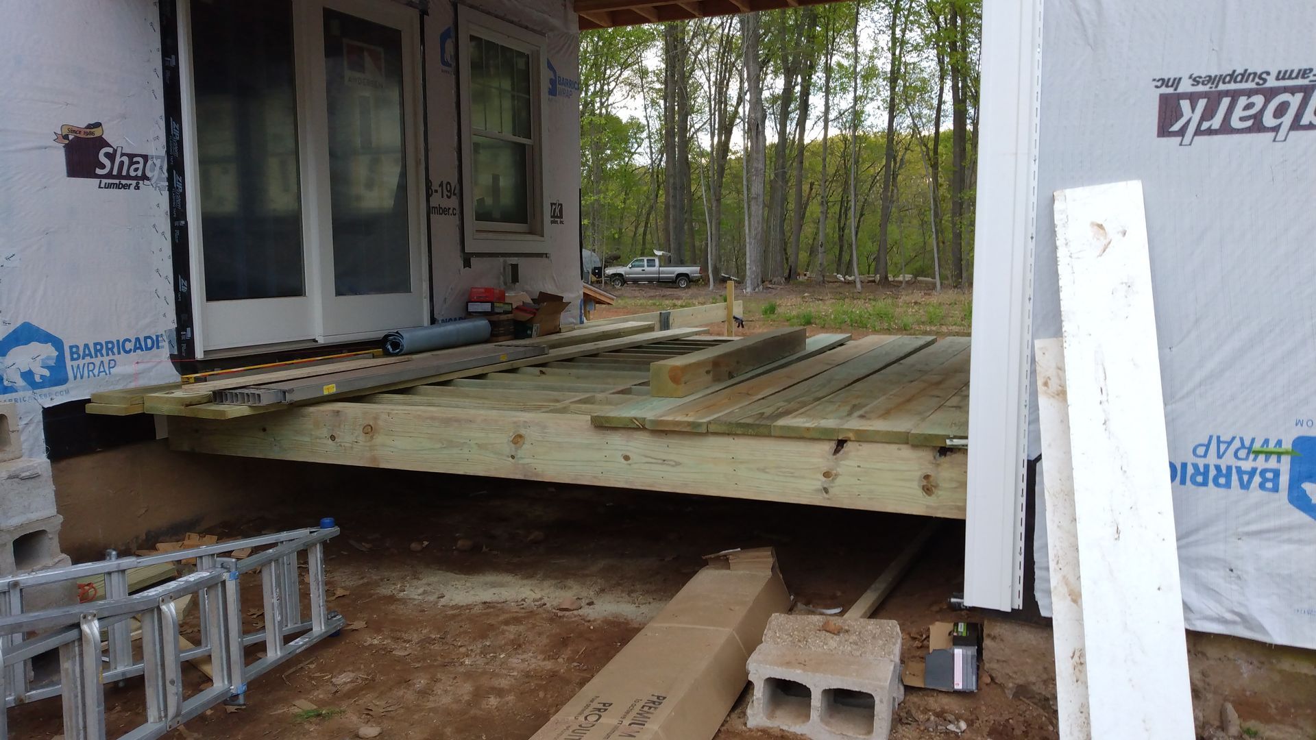 A wooden deck installation​ in Glastonbury CT in progress - Exteriors of CT hard at work