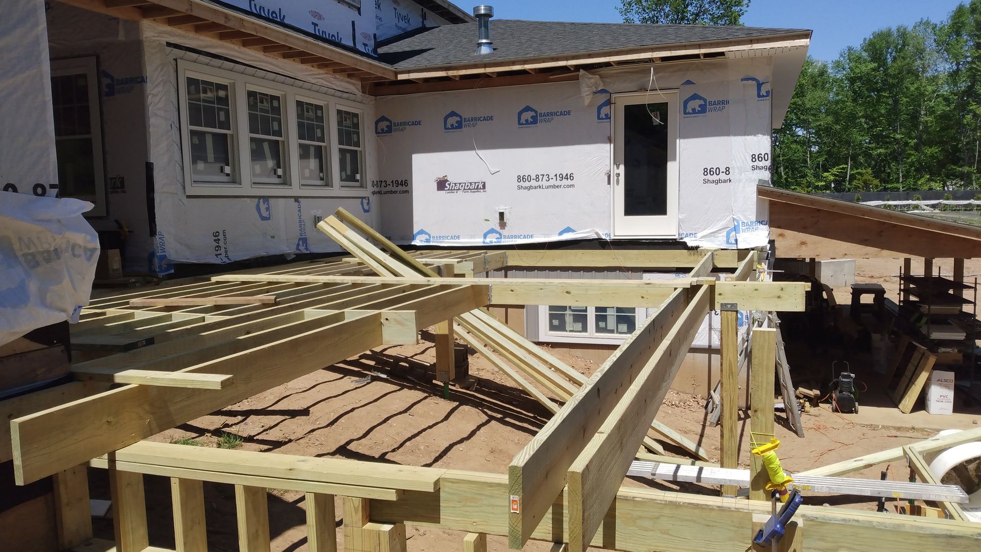 A wooden deck installation​ in Glastonbury CT in progress - Exteriors of CT hard at work