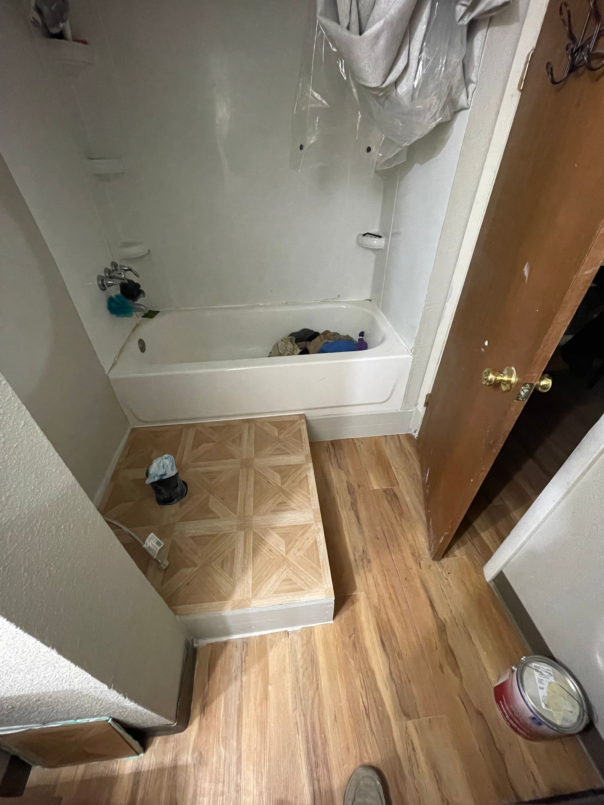 A Bathroom With A Bathtub And A Sink