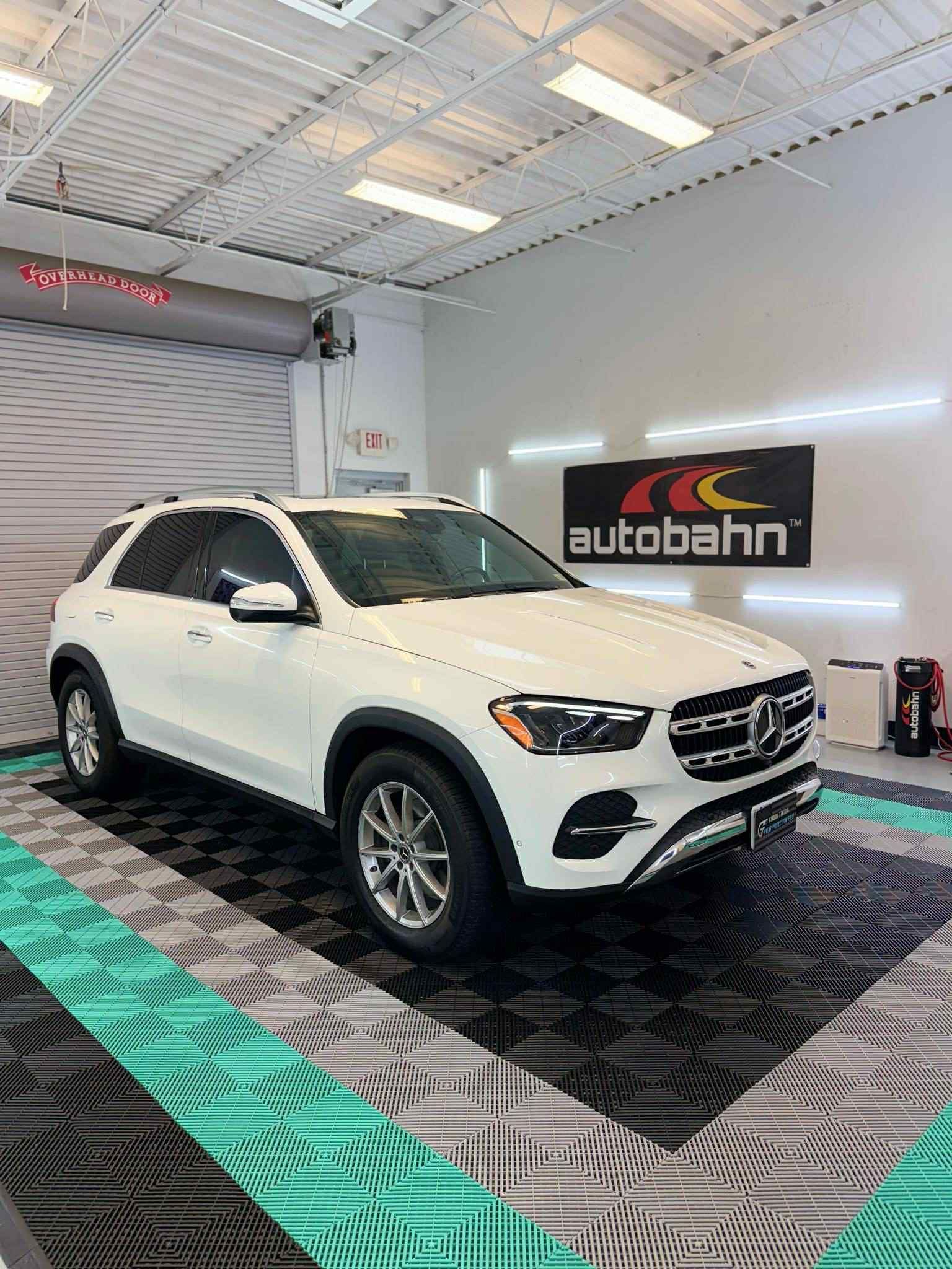 White Mercedes SUV tinted with Autobahn ceramic film at GT Tinting shop in Hampton, VA